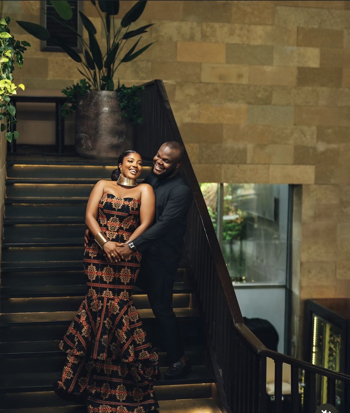 Couple sharing a moment on a staircase